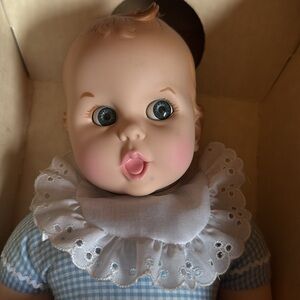 Set of 1979 Gerber Baby Dolls 17” Red and Blue in boxes. Note condition of boxes